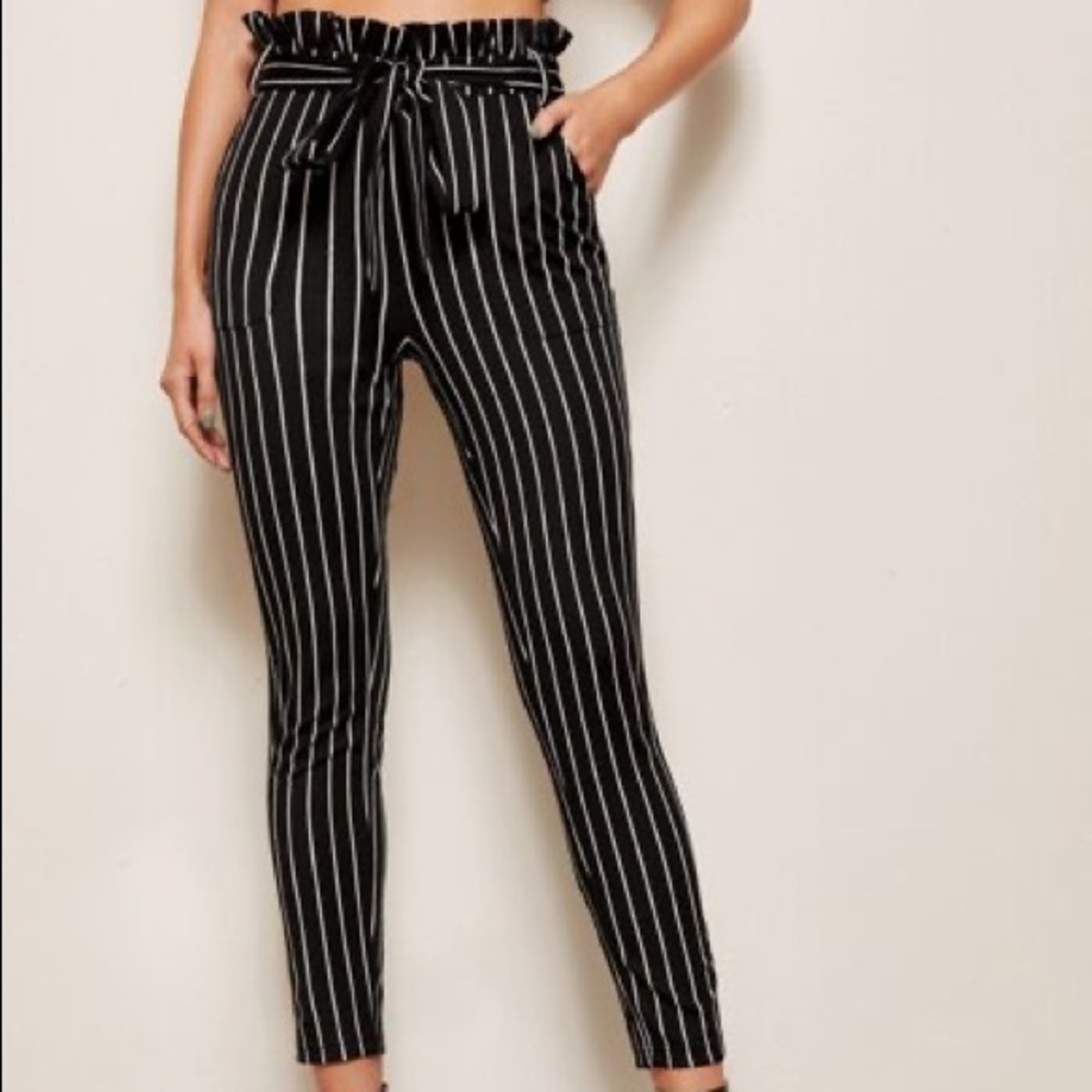 Black and white pinstriped paper bag pants